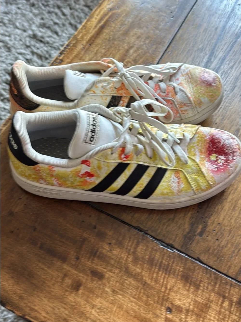 adidas White Low-Top Sneakers with Yellow, Orange & Red Splatter